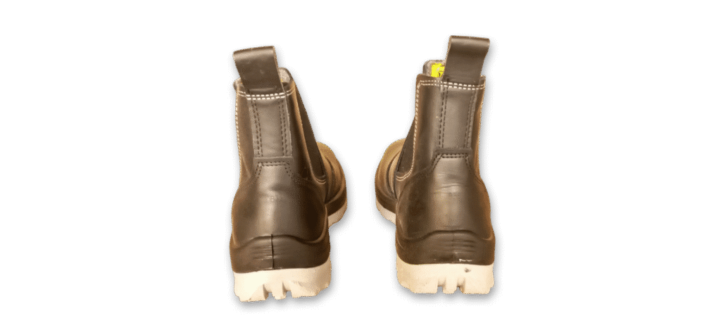 Par de botines de seguridad elásticos GamaX, modelo 108A-118P, en color negro, vistos desde atrás, mostrando los tiradores traseros y las costuras de la suela.